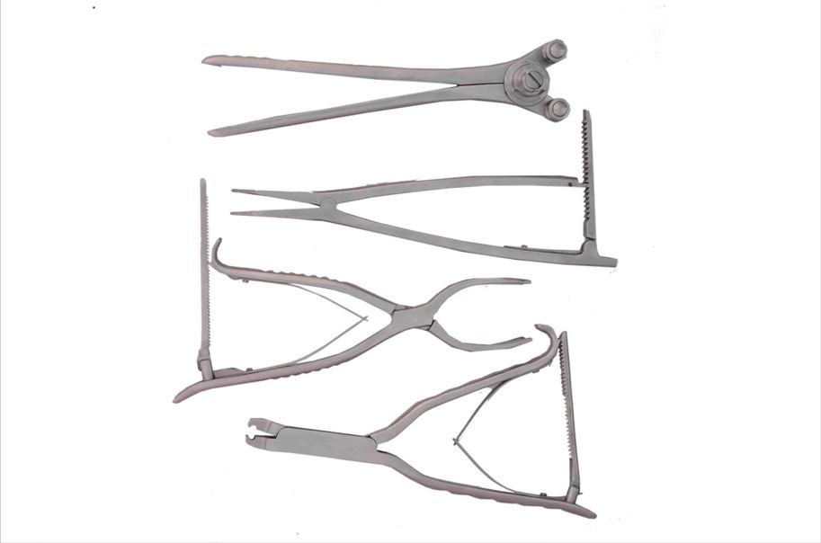 Spinal fixation system instruments