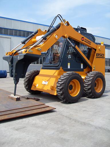 Track Loader With Drill