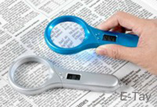 LED LIGHTED HAND HELD MAGNIFIER WITH DIGITAL CLOCK