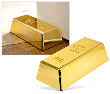 A Gold Bar Door Stop 