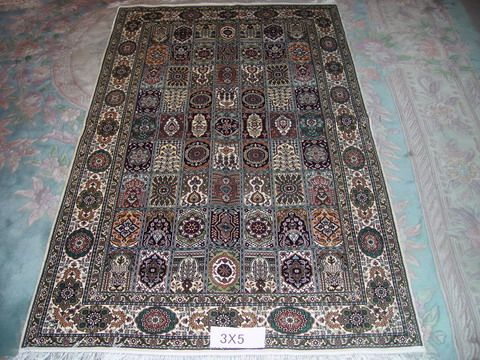 hand-knotted silk carpet in persian style