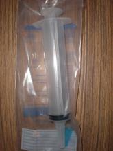 An Amino AMSure piston enteral irrigation syringe