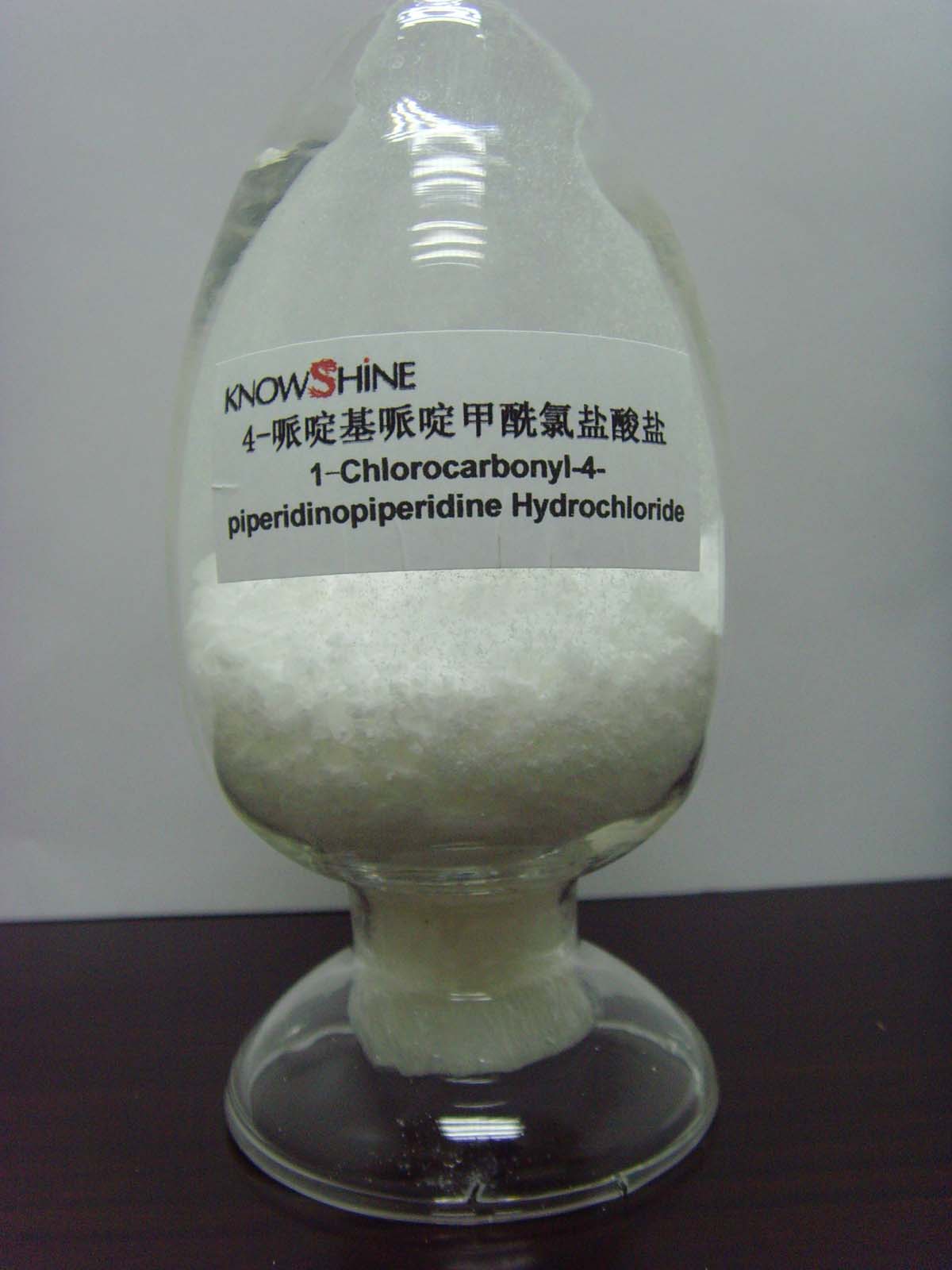 1-chlorocarbonyl-4-Piperidinopiperidine hydrochlor