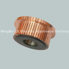 Qb riser type commutator with reinforced ring