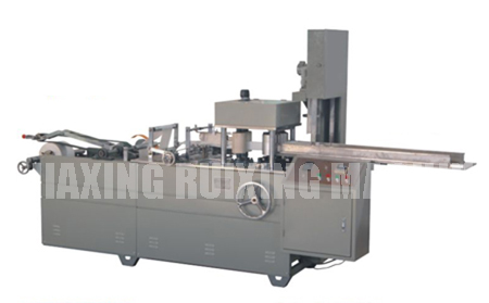 Nonwoven fabric folding machines