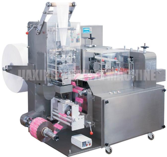 Nonwoven fabric folding machines