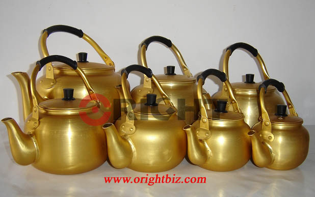 polished aluminium golden kettle