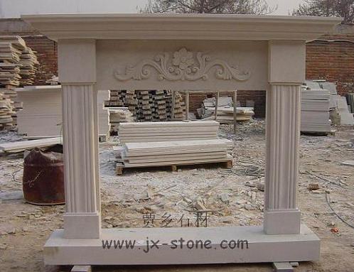 white sandstone fireplace