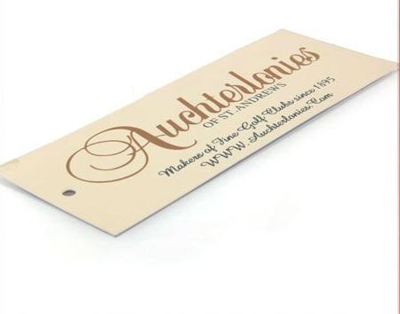 he personaized customized hangtags for vogue clothing