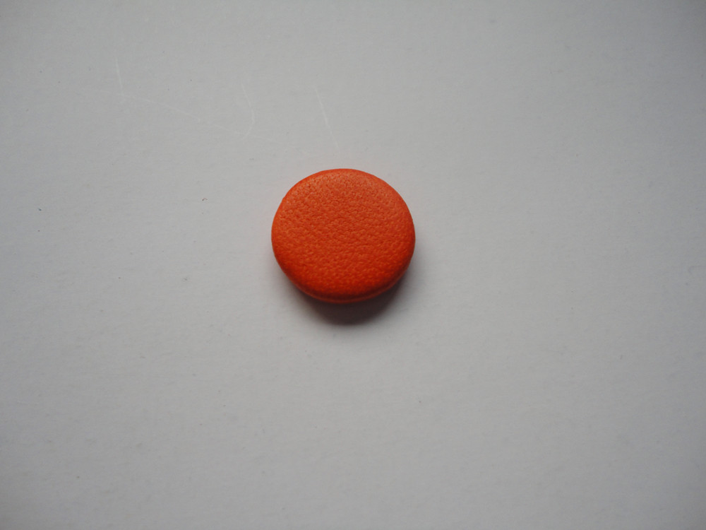 clarinet pads with orange-red leather