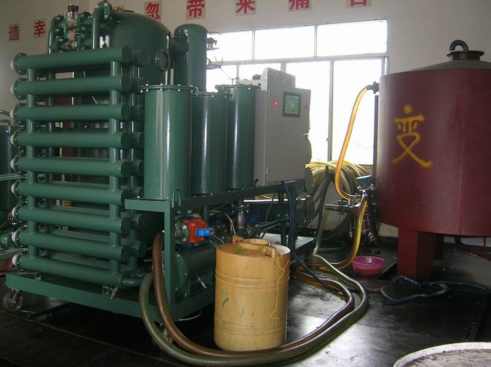 Dielectric oil regeneration system