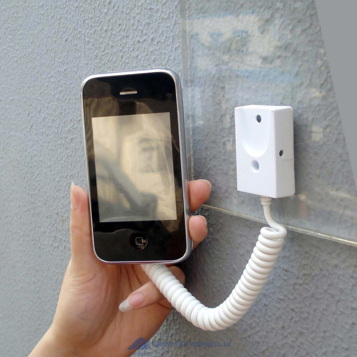 Mechanical security display stand for Cellpho