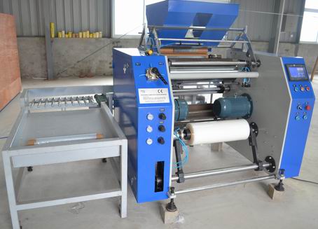 Fully automatic pre stretch film rewinder