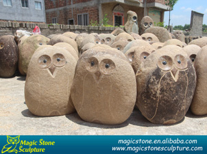 river stone carving owls