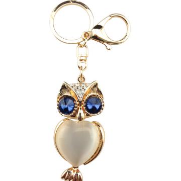 The blue-eyed owl keychain with domestic crystal