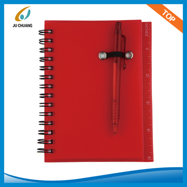 Spiral notebook with pen