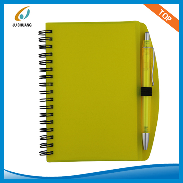 Spiral notebook with pen