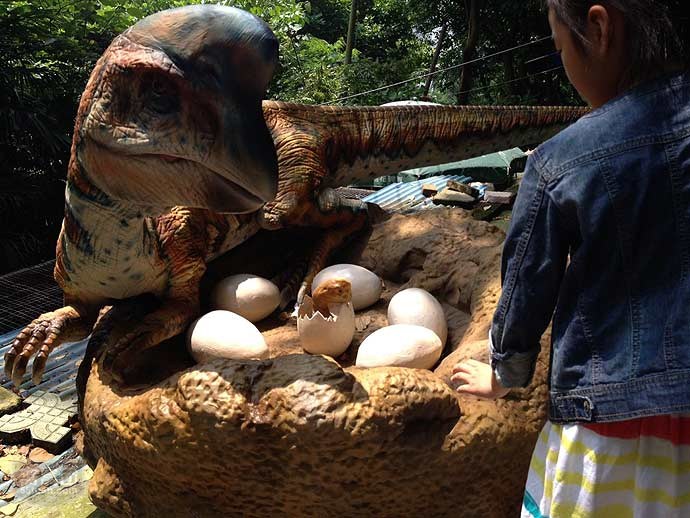 Amusement Park coin - operated walking dinosaurs