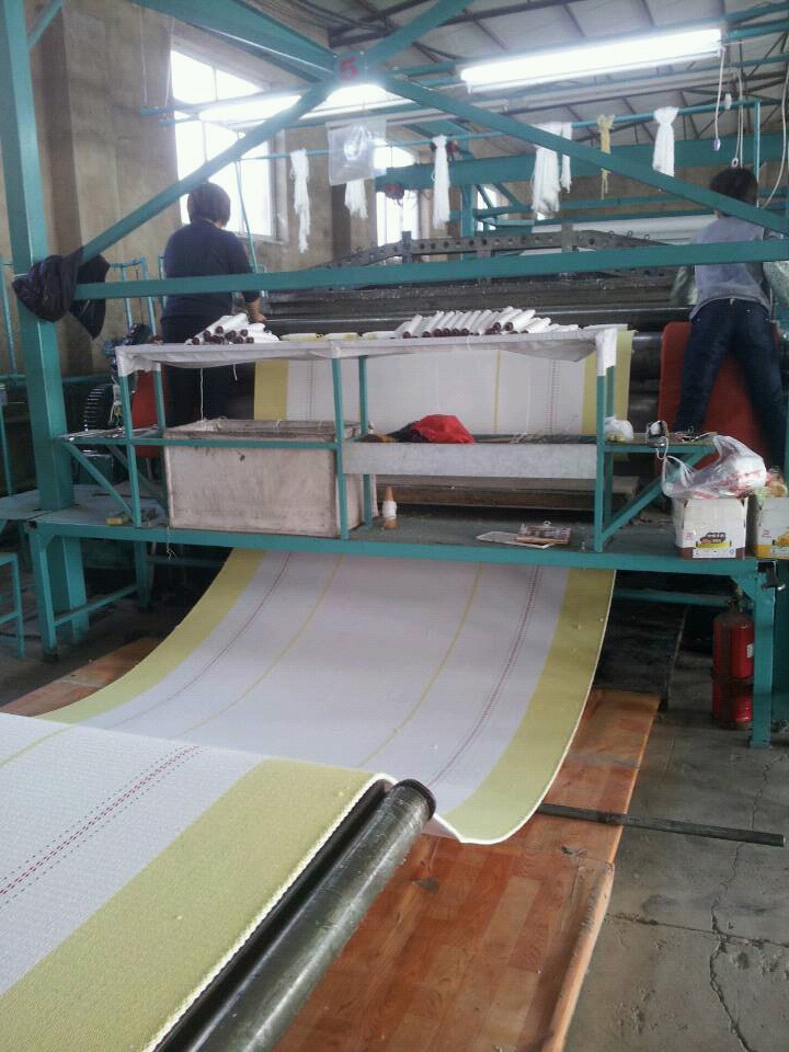Corrugated paper belt .