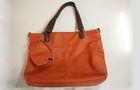 Classic Orange Abrasion resistant Leather High Fashion Handbags with Little Bags