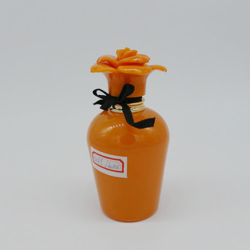empty glass perfume bottle in brand name