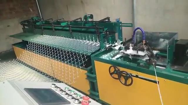 Automatic chain link fence machine